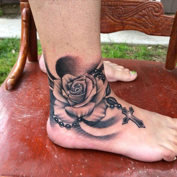 rosary on foot tattoo  german verzegnassi  Flickr