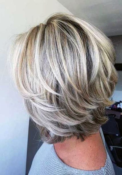 Thick Ashy Blonde Female With Airy Easy Side Part