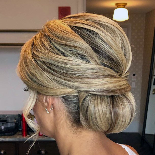 Thick Blonde Chignon Hairstyle For Women