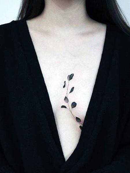 Thin Stalk With Leaves Womens Chest Tattoo