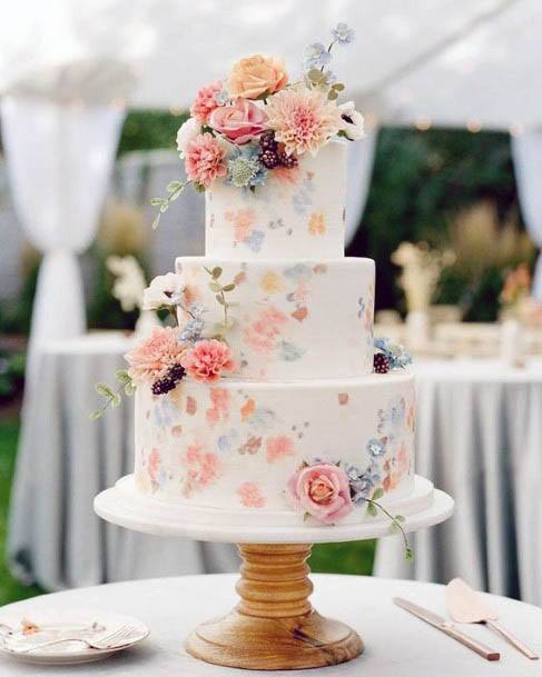 Three Tiered Cake With Spring Wedding Flowers