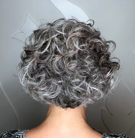 Tight Silver Curled Hairstyles For 50 Year Old Woman With Thick Hair