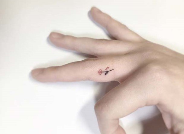 Tiny Flower Tattoo Womens Fingers