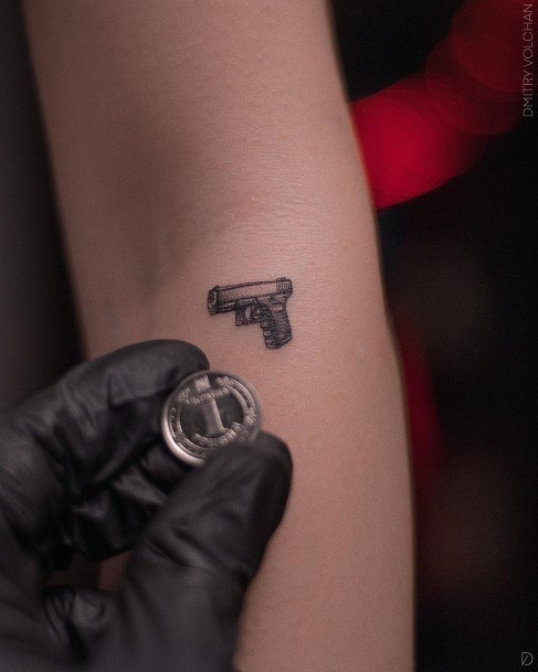 Tiny Quarter Sized Female Gun Tattoos