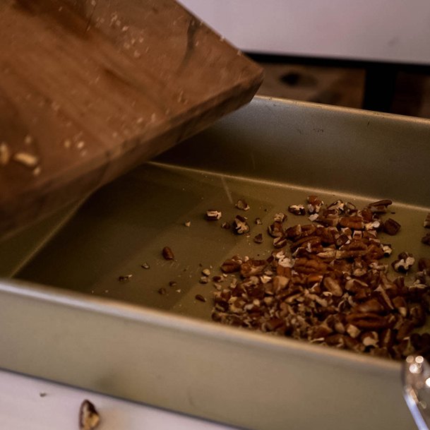 Toasted Pecans In Baking Sheet Candied Carrots Recipe