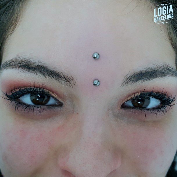 Trendy And Popular Vertical Bridge Third Eye Facial Piercing Ideas For Women