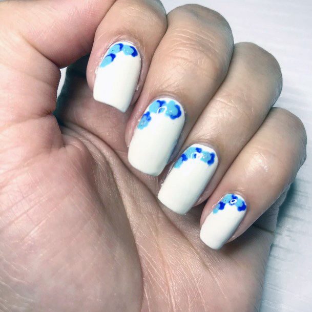 Triple Blue Flowers On White Base Nails For Women