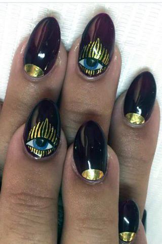 Trippy Eye Design Maroon And Gold Nail Ideas For Ladies