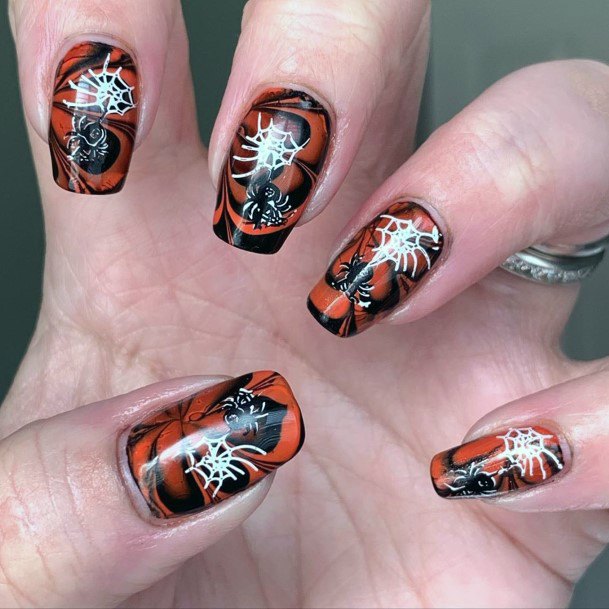 Trippy Girly Halloween Orange And Black Nail Design For Women