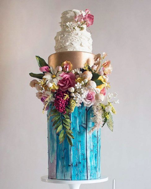 Tropical Inspired Floral And Blue Bottom Tier Wedding Cake Ideas