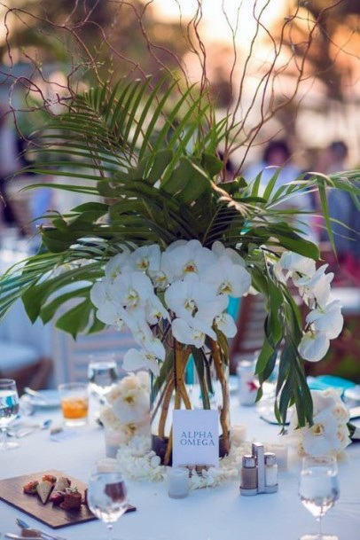 Tropical Palm Leaves And White Flowers Centerpieces Beach Wedding Ideas