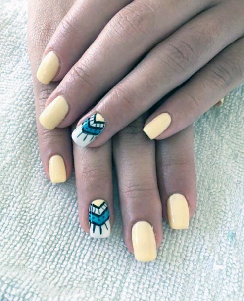 Turquoise Art On Pale Yellow Nails For Women