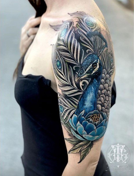 Turquoise Blue Peacock Tattoo On Arms Women