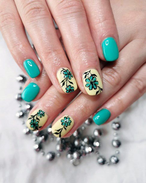 Turquoise Flora On Squoval Nails