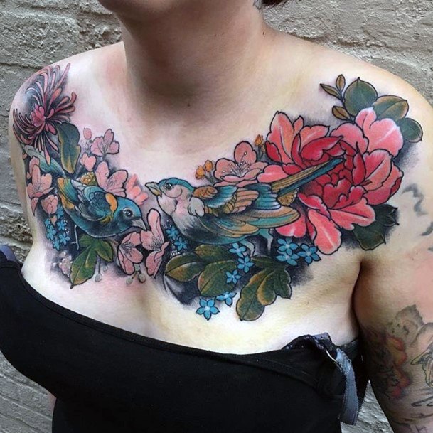 Two Humming Birds And Lovely Red Blossoms Chest Tattoo For Women