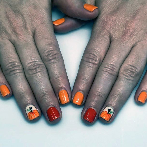 Two Shaded Orange Pumpkin Nails Art For Women