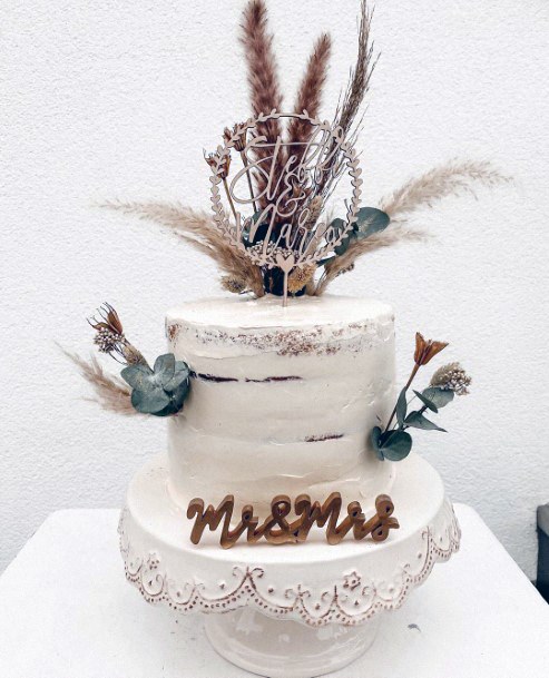 Ultra Bohemian Single Tiered White Cake With Dried Grass And Flowers Wedding Cake Ideas