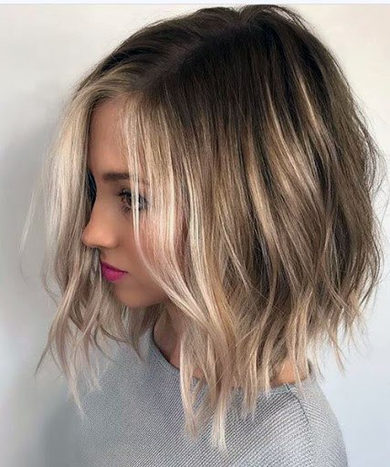 Uneven Blonde Short Hairstyle Women