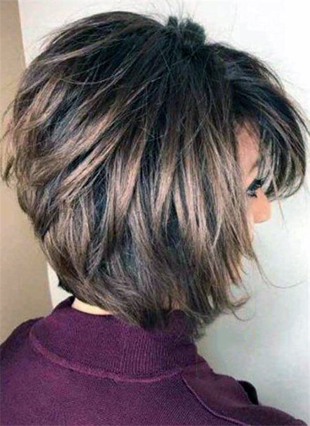 Uneven Long Bob Hairstyle For 50 Year Old Woman With Thick Hair