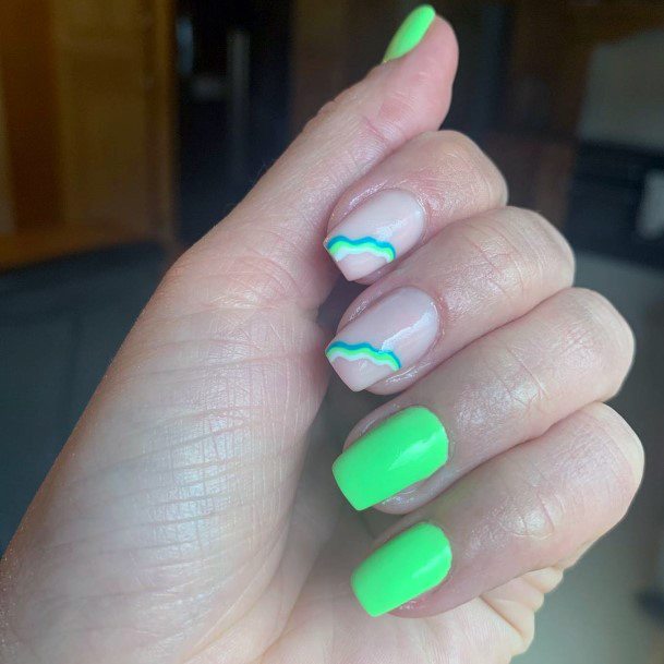 Unique Art Work On Neon Green Painted Nails