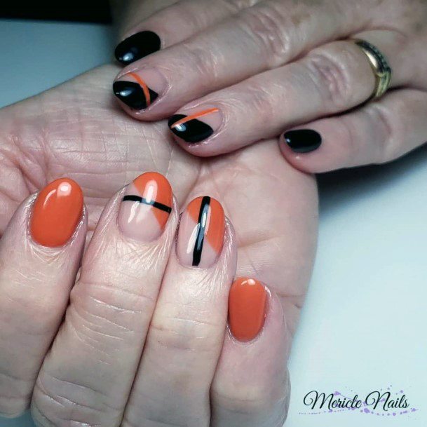 Unique Orange And Black Nail Design Girly