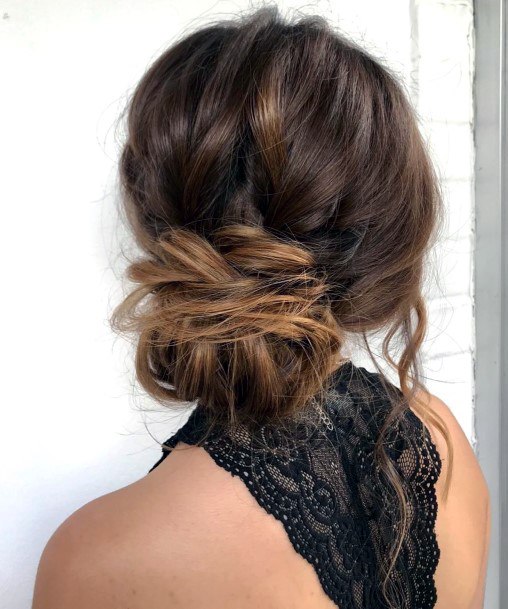 Updo On Girl Loose Bun With Curled Sides