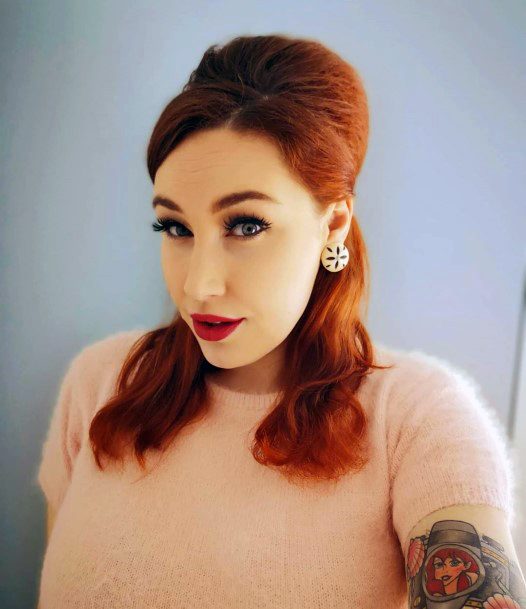 Vibrant And Vintage Retro Redhead Half Up Curly Womens Hairstyle