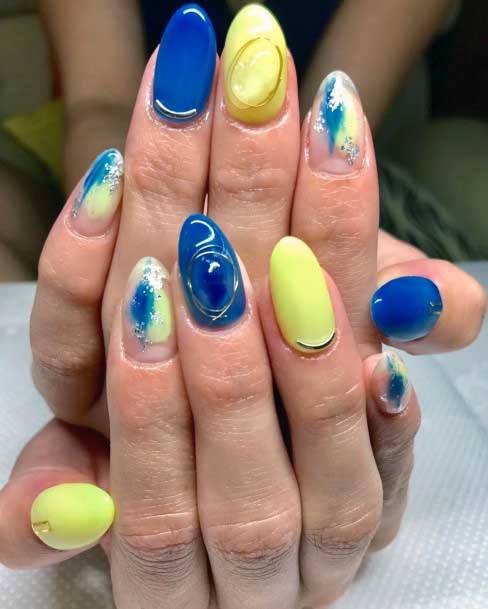 Vibrant Blue And Yellow Nails Women