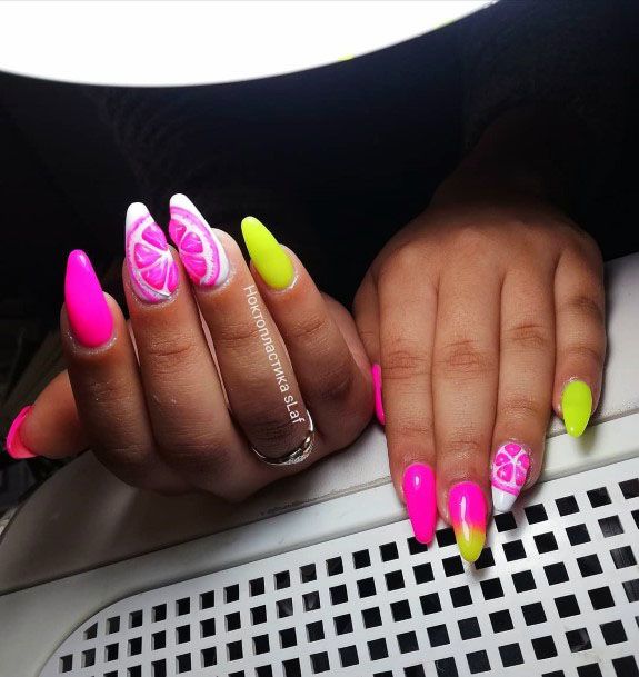 Vibrant Flourescent Two Tone Pink And Yellow Almond Design Inspiration For Ladies Nails