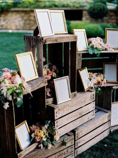 Vintage Frames On Wooden Table Wedding Decor