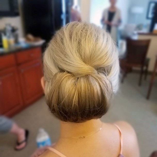 Voluminous Golden Chignon Hairstyle Women