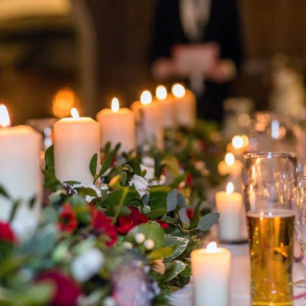 Warm Candles And Winter Wedding Flowers