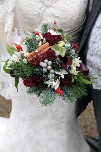 Warm Cinnamon And Greens Christmas Wedding Flowers