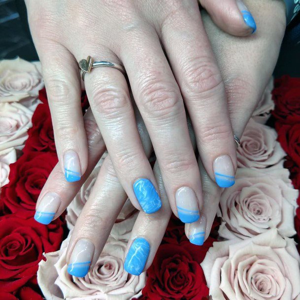 Warm Sky Blue On Squoval Shaped Nails