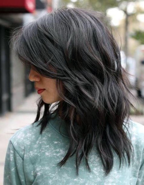 Wavy Female With Natural Black Airy Hairstyles For Women And High Lights