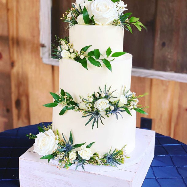 Wedding Cake Ideas Greenery With White And Blue Flowers On White Design