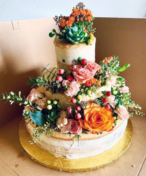 Wedding Cake Ideas Whimsical Woodland Semi Naked Cake With Lush Greenery And Abundant Florals