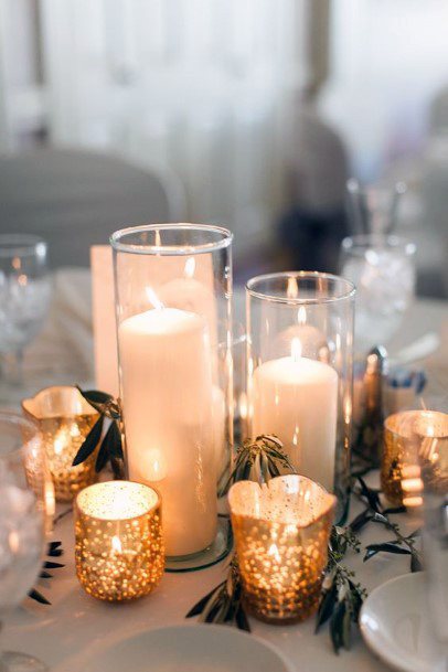 Wedding Centerpiece Ideas Different Size Candles And Gold