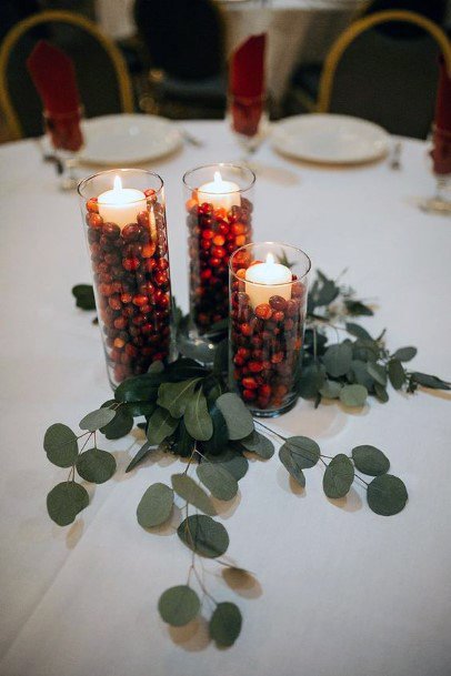 Wedding Centerpiece Ideas Fall Inspired Cranberry Filled Jars And Greenery