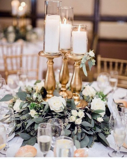 Wedding Centerpiece Ideas Gold Candle Stands With Greenery And White Roses