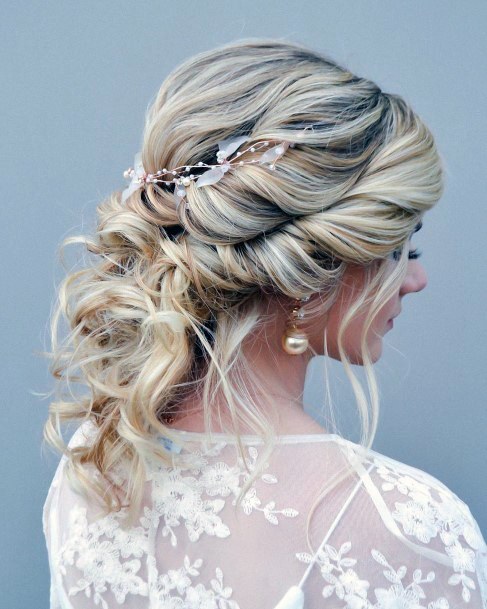 Wedding Hairstyle On Auburn Colored Hair And Floral Headpiece