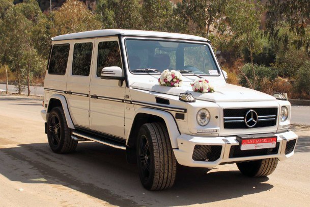 Wedding Jeep With White Flowers Decoration