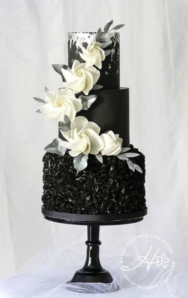 White Blossoms On Black Wedding Cake
