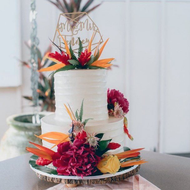 White Cake And Hawaiian Wedding Flowers