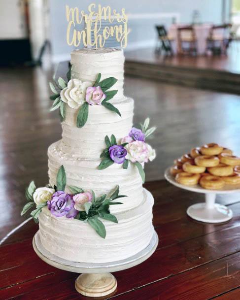 White Cake And Purple Wedding Flowers