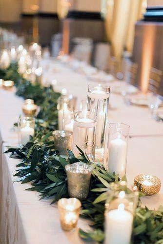 White Candles And Leaves Wedding Head Table Decor