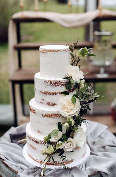 White Creamy Wedding Flowers On Cake