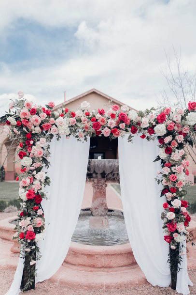 White Curtains And Red Wedding Flowers