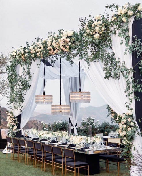 White Curtains And Wedding Flowers