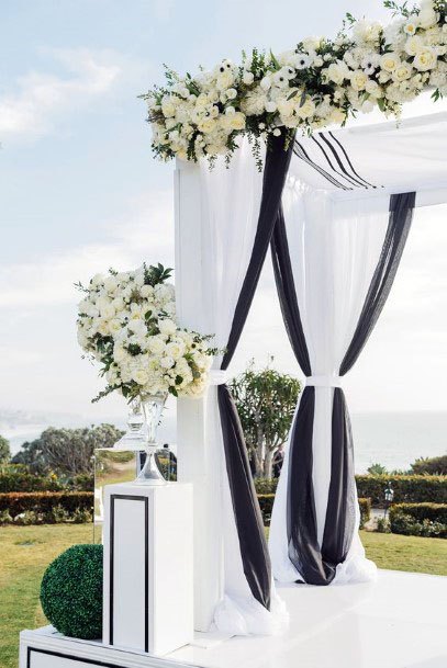 White Dais With Black Borders Wedding Decor